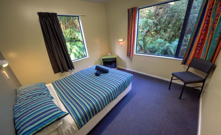 YHA Franz Josef double bed with multiple window viewing