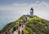 YHA Ahipara travellers checking out lighthouse at Cape Reinga