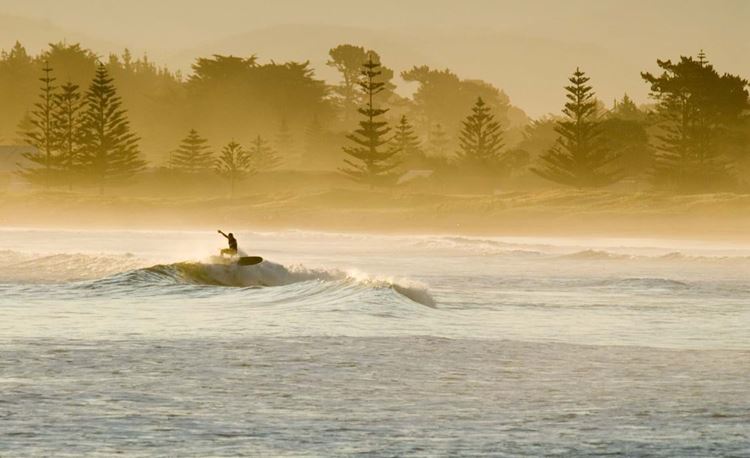 Surfer in Gisborne New Zealand