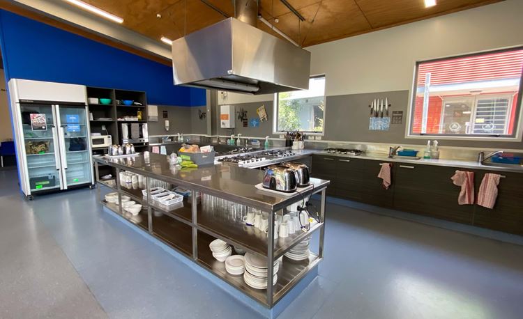 Full shared kitchen at YHA Rotorua for backpackers and families