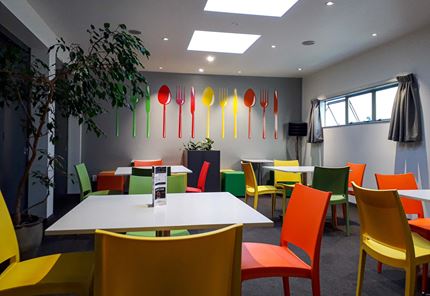 Shared dining room for backpackers, groups and families at YHA Nelson